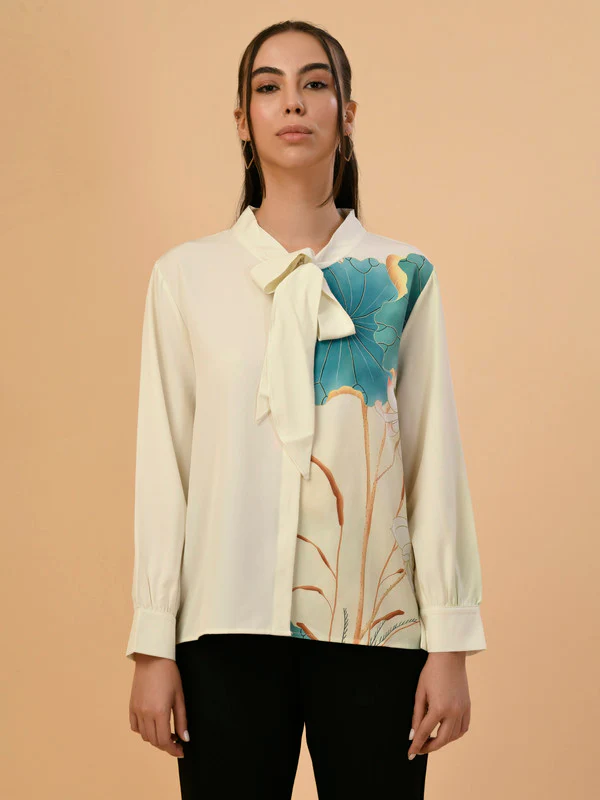 Manufacturer, Exporter, Importer, Supplier, Wholesaler, Retailer, Trader of Cream Casual Women Top in New Delhi, Delhi, India
