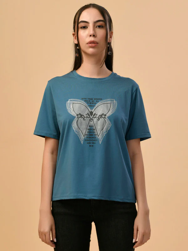 Manufacturer, Exporter, Importer, Supplier, Wholesaler, Retailer, Trader of Ladies Teel Regular T-Shirt in New Delhi, Delhi, India