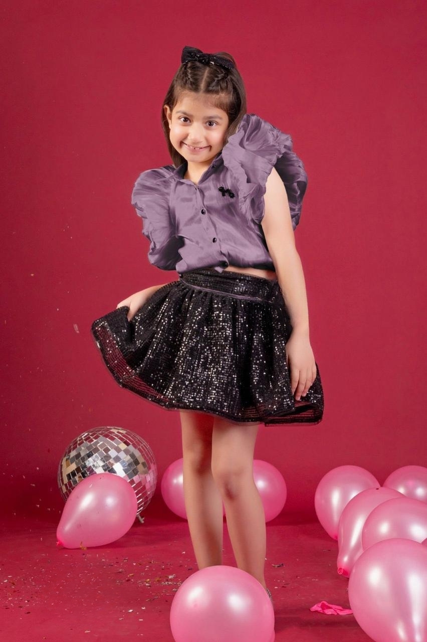 Manufacturer, Exporter, Importer, Supplier, Wholesaler, Retailer, Trader of Purple And Black Colour Skirt Tops For Girls in New Delhi, Delhi, India