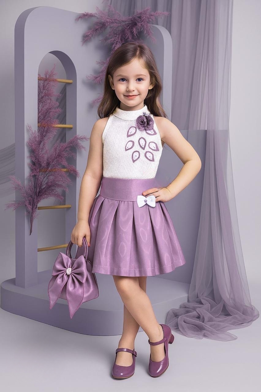 Manufacturer, Exporter, Importer, Supplier, Wholesaler, Retailer, Trader of White And Lavender Colour Skirt Tops For Girls in New Delhi, Delhi, India